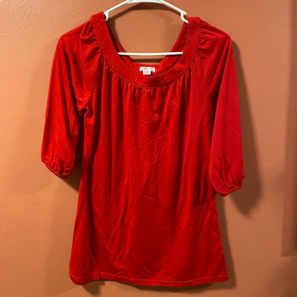 Women’s Xhiliration Red Top.